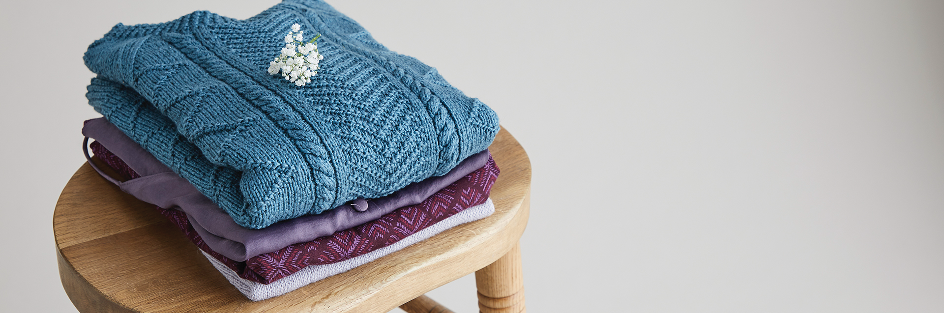 Sweaters on a chair